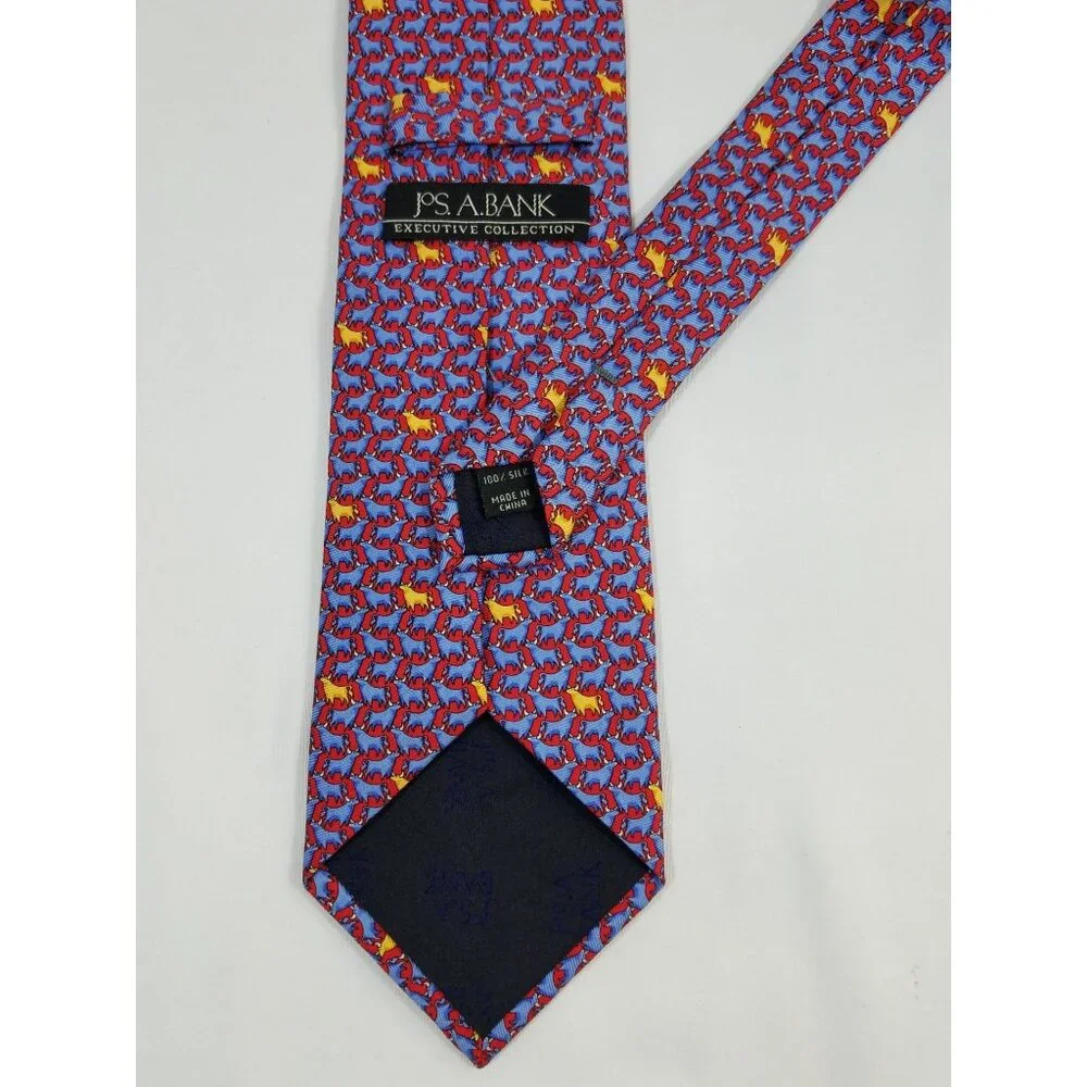 Jos A. Bank Mens Silk Tie Executive Collection Red Blue Cow Bull Steer Print